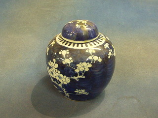 A 19th Century Oriental Prunus pattern ginger jar and cover 9"
