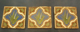 3 Victorian Earthen ware floor tiles decorated Lily of the Valley (some chips)
