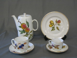 A Royal Worcester Evesham Gold pattern coffee pot, 3 10" dinner plates, 7 9" side plates (some gilding rubbed), 10 8" plates, 10 7" plates, 8 twin handled soup bowls and saucers, 3 coffee cups and saucers, 9 tea cups and saucers, cream jug, 6" twin handled tureen, cake plate and a 7" tureen lid