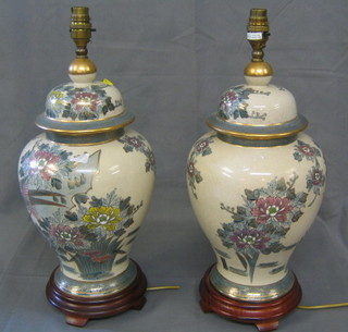 2 Oriental style pottery table lamps in the form of urns and covers 19"