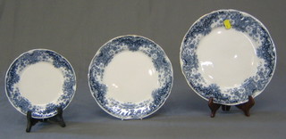 A 37 piece Boothes Lucania blue floral patterned dinner service comprising oval meat plate, 12 10" dinner plates, 12 9" side plates, 12 7" tea plates (some rubbing to gilding)