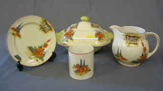 A 35 piece Leighton pottery Old Cottage Window pattern dinner service comprising 3 oval graduated meat plates, (cracked), 3 tureens (1 with cover, 1 cracked) 2 cream jugs (cracked) sauce boat (cracked) preserve jar and stand (cracked), salt and pepper, egg cup (crazed) 9" fruit bowl, 5" circular dish (crazed), 5 9" plates (crazed), 6 7" plates (1 cracked, all crazed), 6 - 6 1/2" plates (3 cracked, 1 crazed) a 5 1/2" plate and a  tea saucer (crazed)