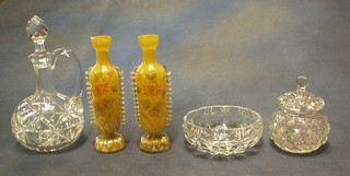 A cut glass ewer and stopper, 2 cut glass vases, a cut glass powder bowl and 1 other bowl