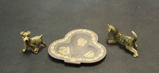 A Wade figure of Tramp the dog and a foreign figure of a stalking cat and a Wedgwood blue Jasperware dish