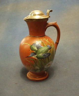 A Victorian terracotta jug decorated a Kingfisher with silver plated mounts (f) 7"