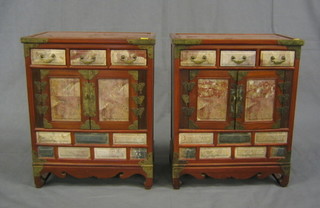 A pair of Oriental Eastern cabinets fitted various drawers and enclosed by panelled doors with marble mounts 17"