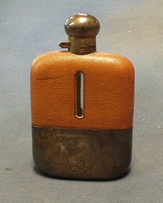 A 19th/20th Century glass and leather bound hip flask with detachable silver cup