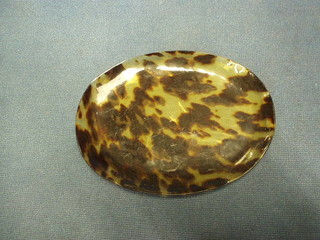 An oval tortoiseshell dish 5 1/2"