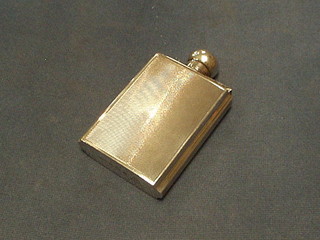 A silver hip flask with engine turned decoration Birmingham 1969, 4 ozs