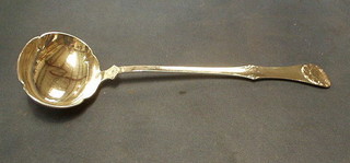 A "Swedish" silver ladle with shell decoration marked 8305, 5 ozs