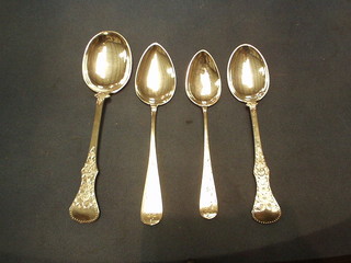 An engraved "Swedish" silver serving spoon and 3 "Swedish" silver engraved table spoons 5 ozs