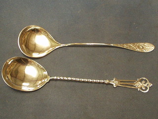 2 "Swedish" silver long handled serving spoons, 4 ozs