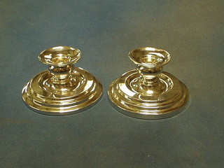 A pair of circular Continental silver stub shaped candlesticks 5"
