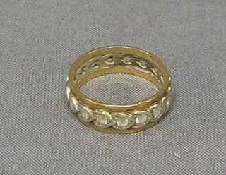 A lady's gold eternity ring