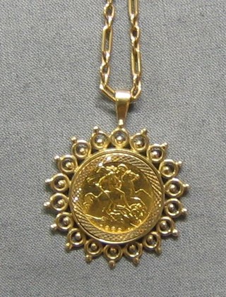 A 9ct gold chain hung a  pendant set a 1982 Elizabeth II half sovereign