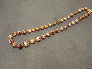 A string of graduated hardstone beads