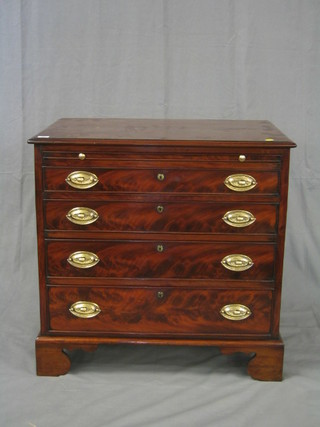 A Georgian mahogany chest fitted a brushing slide and 4 long drawers, raised on bracket feet 31"