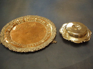 An engraved silver plated salver with bracketed border and a silver plated muffin dish