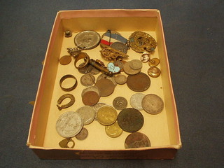 A George V issue Royal Engineers cap badge and a collection of various coins