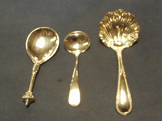 A George III silver Old English pattern sauce ladle, London 1820, a Continental silver plated preserve spoon and a silver plated ladle (3)