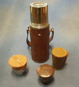 A silver plated hip flask and 3 various drinking cups