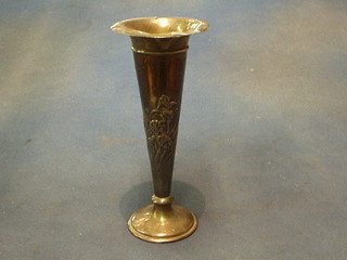 An Edwardian embossed silver trumpet shaped vase decorated flowers, London 1903, 9"