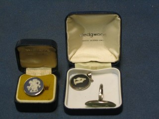 A Wedgwood pendant, a Wedgwood marquise shaped ring and a circular ring (3)