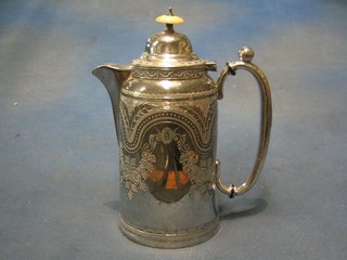 A Victorian engraved Britannia metal hot water jug with hinged lid