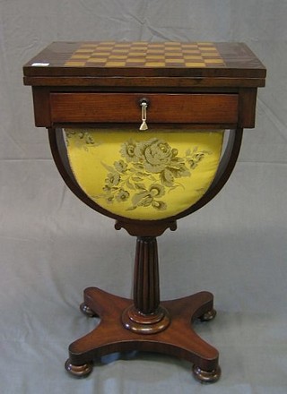A William IV mahogany games/work table, the top inlaid a chessboard above 1 long drawer, the base fitted a deep U shaped basket raised on a U support with reeded column and triform base 19"