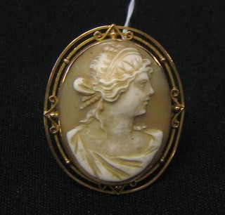 A 19th Century shell carved cameo portrait pendant/brooch contained in a gold mount