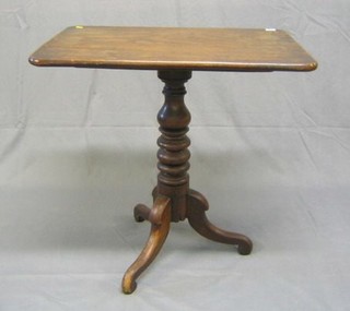 A Georgian rectangular mahogany snap top wine table raised on bulbous turned column and tripod supports 29"