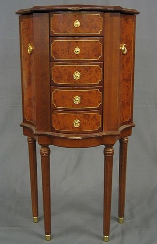 A Franklyn Mint Faberge "Heirloom" jewellery cabinet on reeded supports