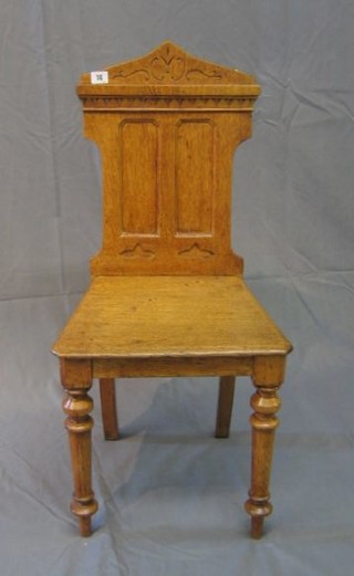 A honey oak hall chair