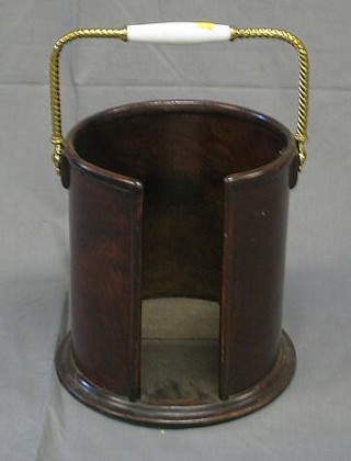 A 19th Century plate bucket with brass and ceramic handle