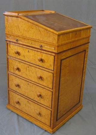A Victorian Birdseye maple Davenport desk with three-quarter gallery and inset tooled leather writing surface, the pedestal fitted inkwell drawer, 2 brushing slides and 4 drawers with tore handles 20"