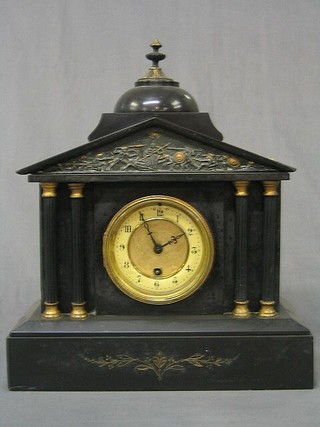 A Victorian French 8 day  mantel clock contained in a black marble architectural case