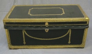 A 19th Century camphor wood, leather bound and brass banded trunk with hinged lid 36"