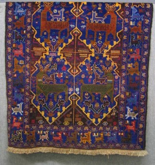 A contemporary Hirathi rug with blue ground and geometric designs, decorated stags 75" x 46"