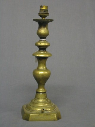 A 19th Century brass candlestick, the base engraved "To Prince Albert or Friendly Society of Car Proprietors" converted to an electric table lamp 12"