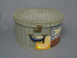 A circular hat box with Union Castle label, Windsor Castle to Capetown