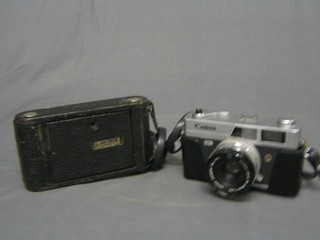 A Canon CL camera and a Kodak No. Autographic Junior folding camera