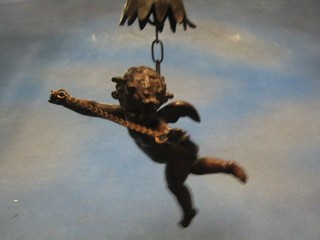 A bronze hanging light fitting support in the form of a cherub in flight 9"