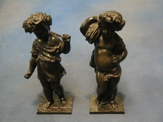 A pair of 19th Century bronze figures of Harvesters with grapes and corn, raised on square bases 8"