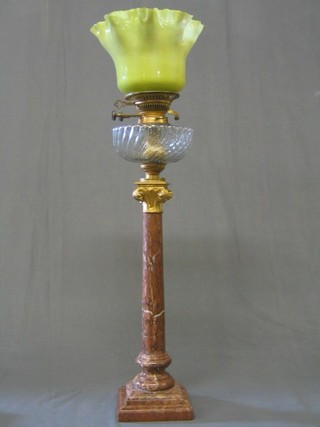 A fine quality 19th Century cut glass oil lamp reservoir with vaseline glass shade, raised on a marble stepped column 25"