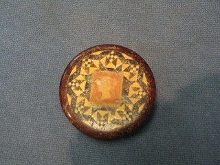 A 19th Century circular Tunbridge ware stamp box, the lid decorated a penny red 2"
