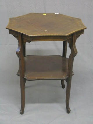 An Edwardian octagonal inlaid mahogany occasional table with undertier, raised on cabriole supports 25"