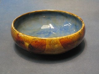 A circular Royal Doulton bowl decorated Autumn Leaves, the base marked Royal Doulton X6329 2031, incised MB, 7" (the base with 1/4" chip)