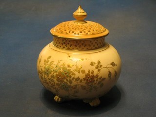 A Worcester Royal China Works, ivory blush ground pot pouri with floral decoration and pierced grill, the base marked 293 G6039 (f and r to rim grill) 5"