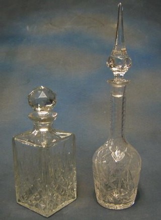 A cut glass spirit decanter and cut glass club shaped decanter