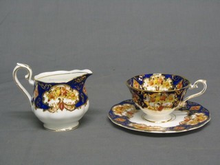 A 23 piece Royal Albert Heirloom pattern tea service with 6 tea cups, sugar bowl, cream jug, 9 cups, 6 saucers